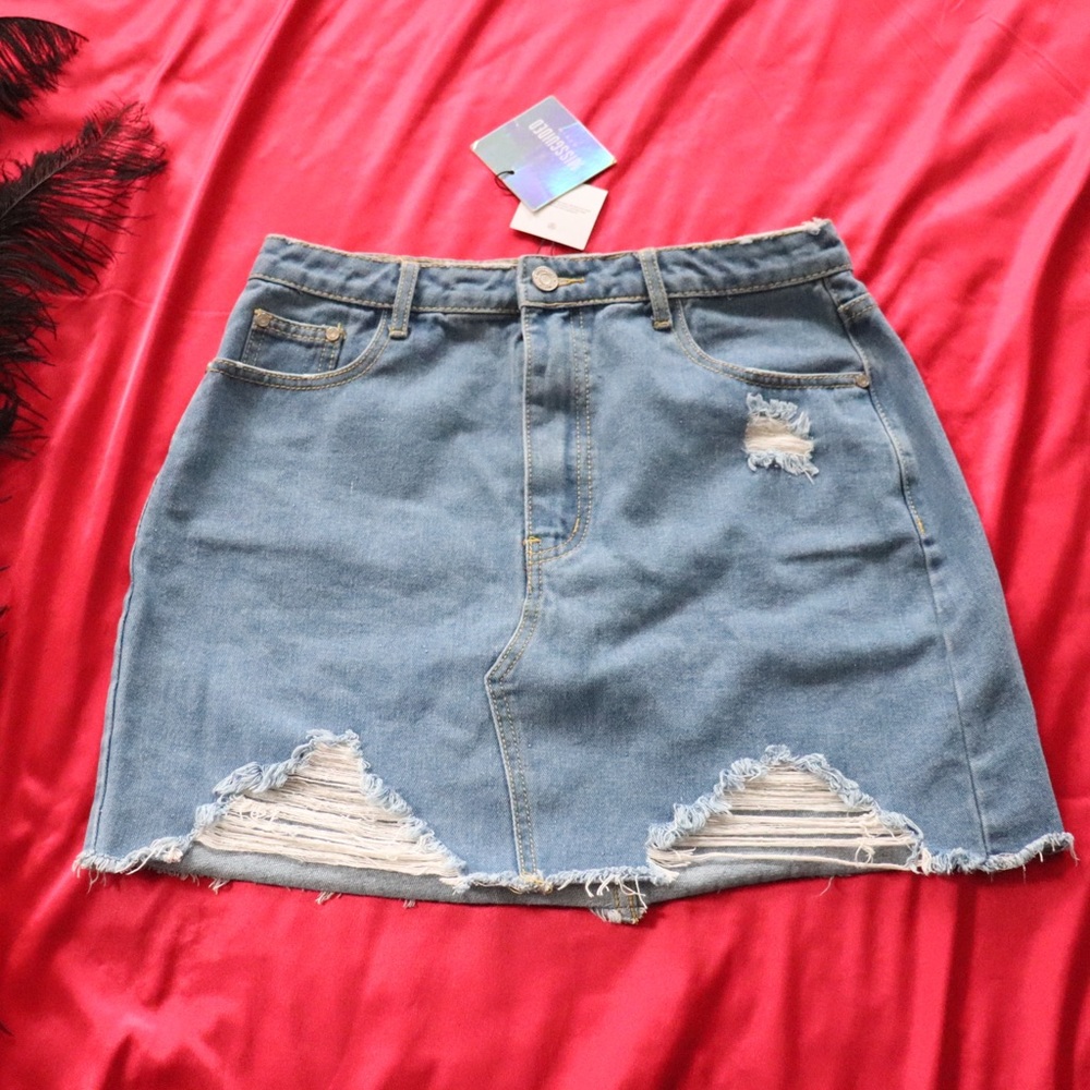 Distressed light wash denim skirt from Misguided